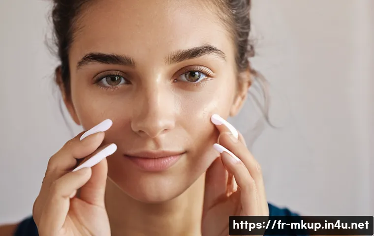 스포티한 메이크업 스타일링 팁 - A close-up portrait of a young French woman applying lightweight BB cream with her fingers before a ...